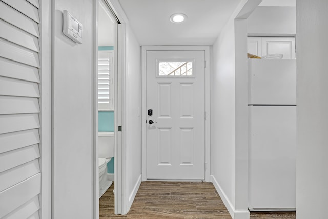 12003 Poinciana Blvd Unit 102, Royal Palm Beach, FL 33411 - doorway to outside with wood finished floors and recessed lighting
