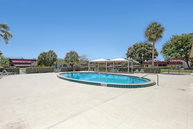12003 Poinciana Blvd Unit 102, Royal Palm Beach, FL 33411 - community pool with a gazebo and a patio area