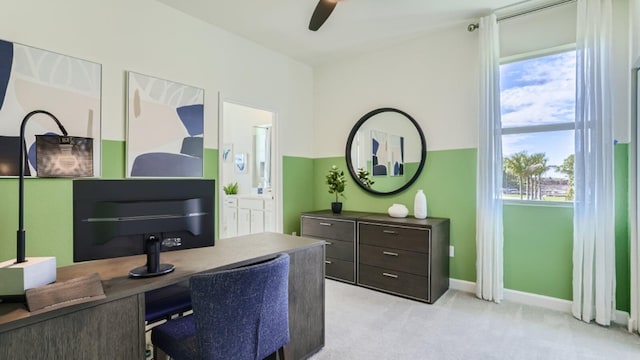 555 SE Rivergrass St, Port Saint Lucie, FL 34984 - home office featuring ceiling fan, plenty of natural light, light carpet, and baseboards