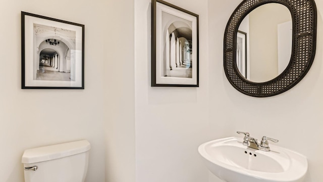 555 SE Rivergrass St, Port Saint Lucie, FL 34984 - bathroom featuring a sink and toilet