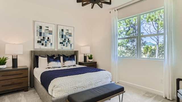 555 SE Rivergrass St, Port Saint Lucie, FL 34984 - bedroom featuring light carpet and baseboards