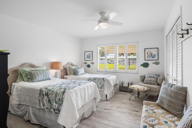 1045 Circle Ter E Unit D, Delray Beach, FL 33445 - bedroom with wood finished floors and a ceiling fan