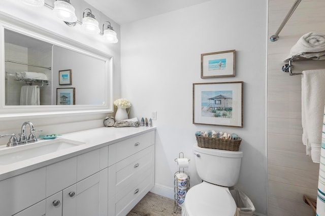 1045 Circle Ter E Unit D, Delray Beach, FL 33445 - full bath with vanity, curtained shower, toilet, wood finished floors, and baseboards
