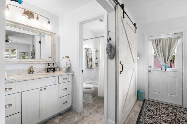 1045 Circle Ter E Unit D, Delray Beach, FL 33445 - full bath with toilet, wood finished floors, vanity, and shower / bath combo