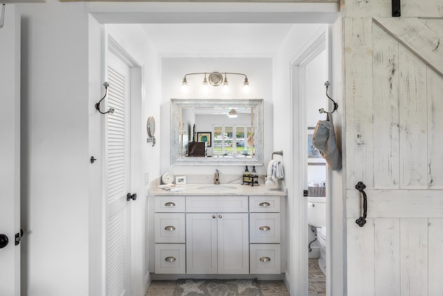 1045 Circle Ter E Unit D, Delray Beach, FL 33445 - bathroom featuring toilet and vanity