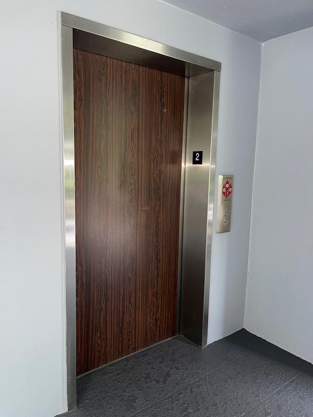 650 SW 124th Ter Unit 202P, Pembroke Pines, FL 33027 - hallway featuring elevator