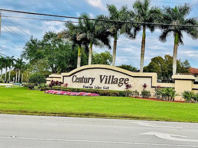 650 SW 124th Ter Unit 202P, Pembroke Pines, FL 33027 - community sign with a yard