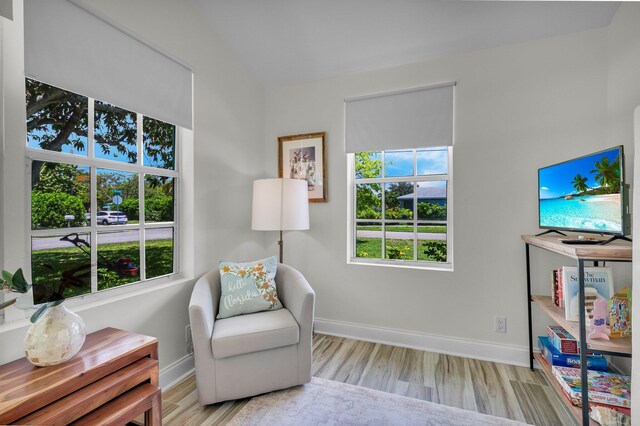 301 SW 1st Ave, Delray Beach, FL 33444 - sitting room with wood finished floors and baseboards