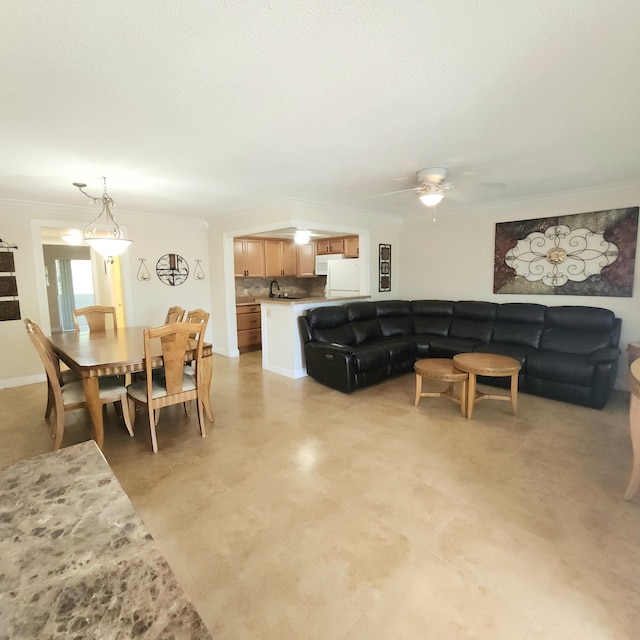 173 Kent J, West Palm Beach, FL 33417 - living room with a ceiling fan and ornamental molding
