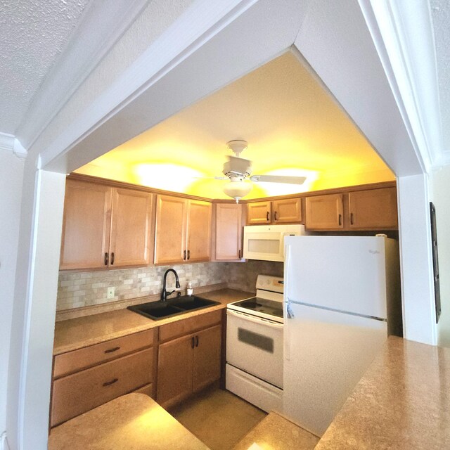 173 Kent J, West Palm Beach, FL 33417 - kitchen featuring white appliances, a sink, decorative backsplash, light countertops, and a textured ceiling