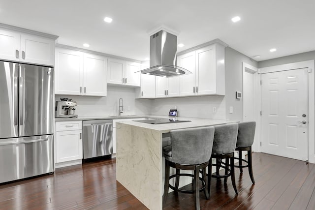 545 Trace Cir Unit 106, Deerfield Beach, FL 33441 - kitchen featuring stainless steel appliances, island range hood, a sink, dark wood-type flooring, and recessed lighting