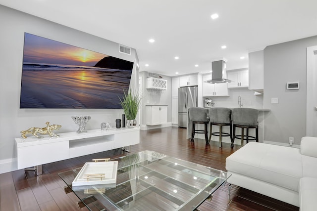545 Trace Cir Unit 106, Deerfield Beach, FL 33441 - living area featuring dark wood finished floors, recessed lighting, and baseboards
