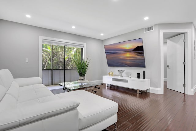545 Trace Cir Unit 106, Deerfield Beach, FL 33441 - living room featuring recessed lighting, baseboards, and wood finished floors