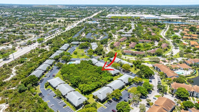 545 Trace Cir Unit 106, Deerfield Beach, FL 33441 - aerial view of property and surrounding area featuring a nearby body of water and nearby suburban area
