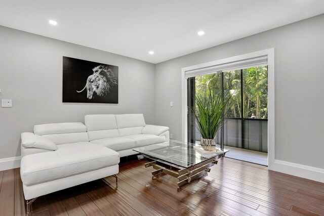 545 Trace Cir Unit 106, Deerfield Beach, FL 33441 - living room featuring wood finished floors, baseboards, and recessed lighting