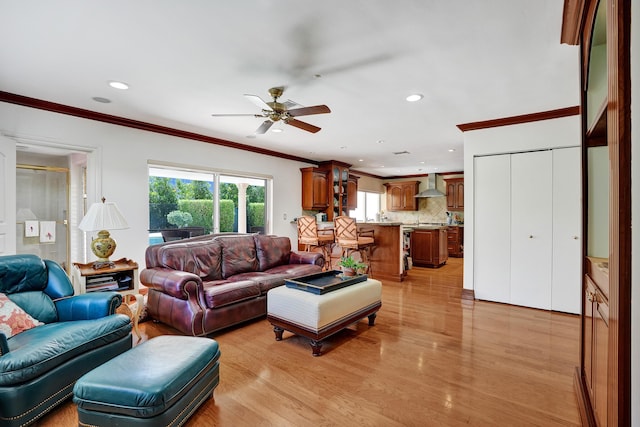 1360 SW Sugar Plum Dr, Boca Raton, FL 33486 - living room with ornamental molding, ceiling fan, recessed lighting, and light wood-type flooring