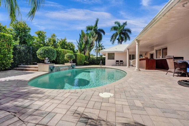 1360 SW Sugar Plum Dr, Boca Raton, FL 33486 - swimming pool featuring a patio area
