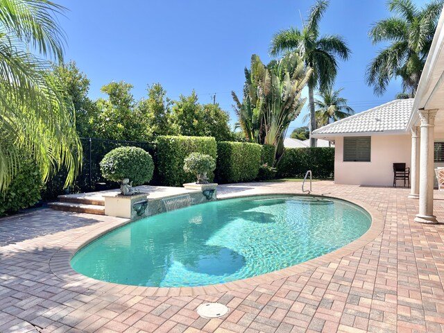 1360 SW Sugar Plum Dr, Boca Raton, FL 33486 - view of pool with a patio
