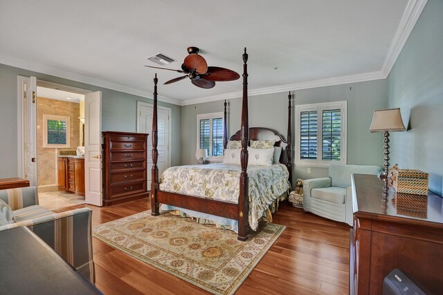 1360 SW Sugar Plum Dr, Boca Raton, FL 33486 - bedroom featuring wood finished floors, ornamental molding, ensuite bathroom, and a ceiling fan