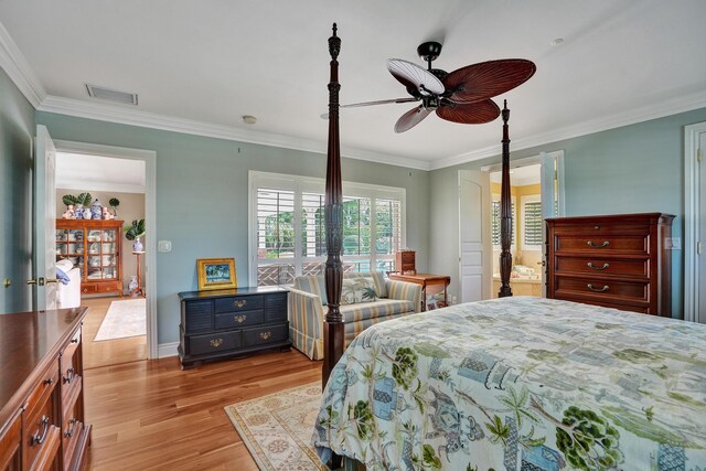 1360 SW Sugar Plum Dr, Boca Raton, FL 33486 - bedroom featuring light wood finished floors, crown molding, baseboards, and a ceiling fan
