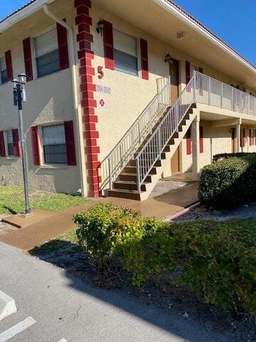 3566 N University Dr Unit F-5, Coral Springs, FL 33065 - view of building exterior featuring stairway
