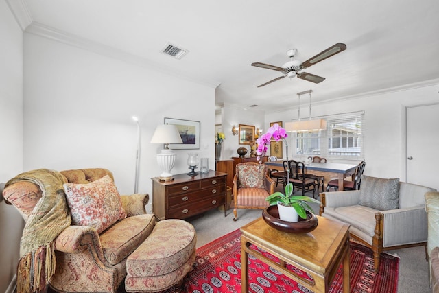 520 NE 7th Ave Unit 2E, Delray Beach, FL 33483 - living room featuring carpet floors, ornamental molding, and a ceiling fan