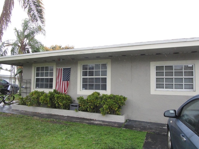 view of front of home with stucco siding