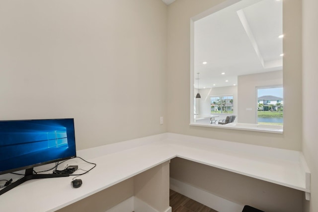 unfurnished office with recessed lighting and wood finished floors
