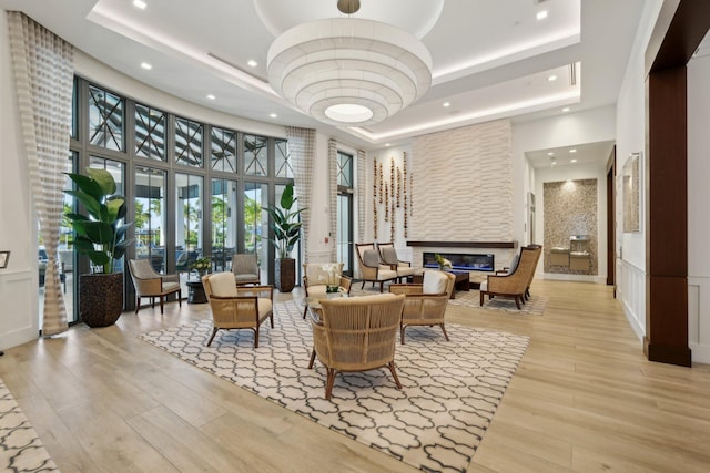 lobby featuring a towering ceiling and recessed lighting