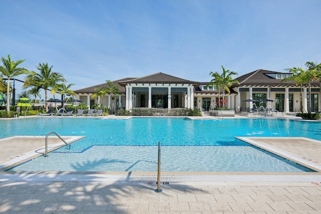 community pool with a patio