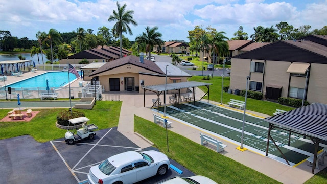 aerial perspective of suburban area with a pool