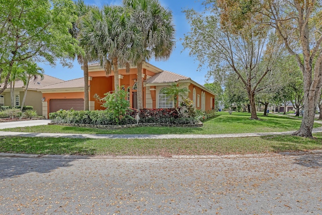 1741 Annandale Cir, Royal Palm Beach, FL 33411 - view of front facade featuring a tile roof, a garage, stucco siding, and a front lawn
