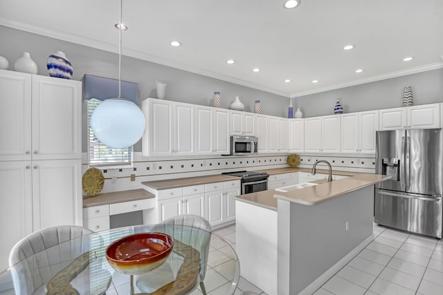 1741 Annandale Cir, Royal Palm Beach, FL 33411 - kitchen featuring appliances with stainless steel finishes, a sink, tasteful backsplash, light tile patterned flooring, and white cabinetry