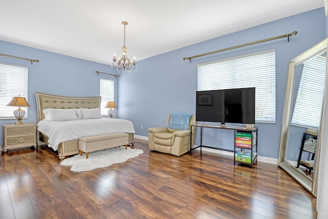 1741 Annandale Cir, Royal Palm Beach, FL 33411 - bedroom featuring wood finished floors, a chandelier, and baseboards
