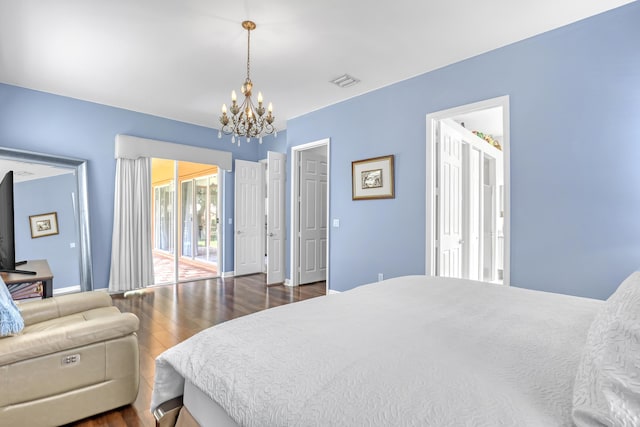 1741 Annandale Cir, Royal Palm Beach, FL 33411 - bedroom featuring a chandelier, dark wood-style floors, and baseboards