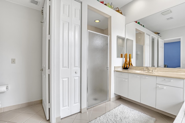 1741 Annandale Cir, Royal Palm Beach, FL 33411 - full bathroom featuring tile patterned floors, vanity, a shower stall, and a closet