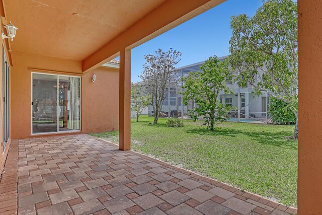 1741 Annandale Cir, Royal Palm Beach, FL 33411 - view of patio / terrace featuring glass enclosure