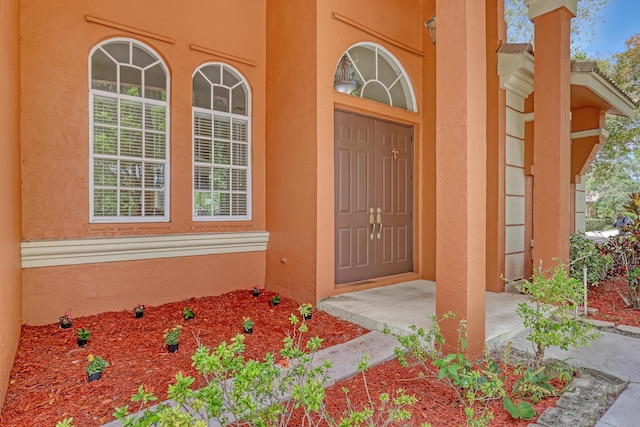 1741 Annandale Cir, Royal Palm Beach, FL 33411 - doorway to property featuring stucco siding