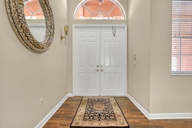 1741 Annandale Cir, Royal Palm Beach, FL 33411 - foyer featuring baseboards and dark wood-type flooring