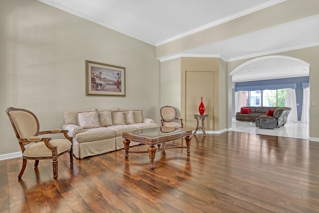 1741 Annandale Cir, Royal Palm Beach, FL 33411 - living area with arched walkways, baseboards, wood finished floors, and ornamental molding