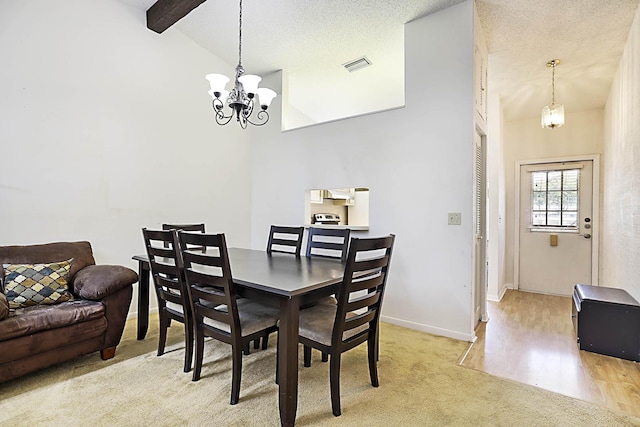1017 Green Pine Blvd E, West Palm Beach, FL 33409 - dining space featuring a chandelier, baseboards, and light colored carpet