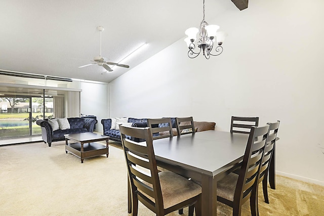 1017 Green Pine Blvd E, West Palm Beach, FL 33409 - dining room featuring light carpet, lofted ceiling, a ceiling fan, a chandelier, and baseboards