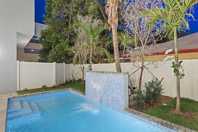 view of pool featuring a fenced backyard