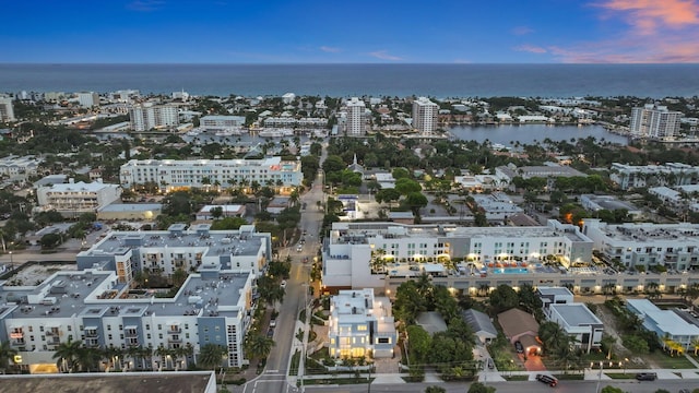 view of urban area featuring a large body of water