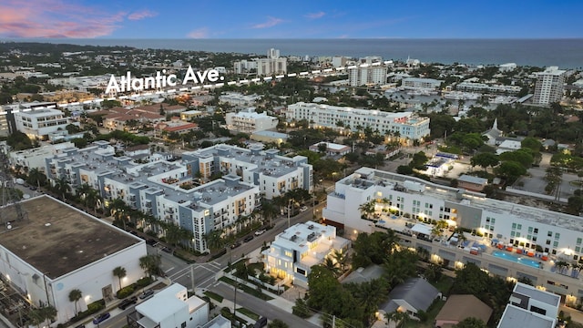 view of urban area featuring a nearby body of water