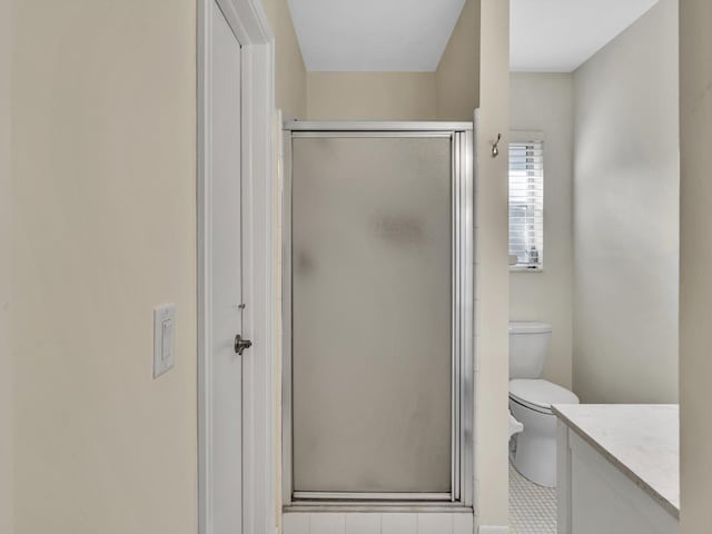 2710 SW 6th St SW, Boynton Beach, FL 33435 - bathroom featuring toilet, a shower stall, vanity, and tile patterned flooring