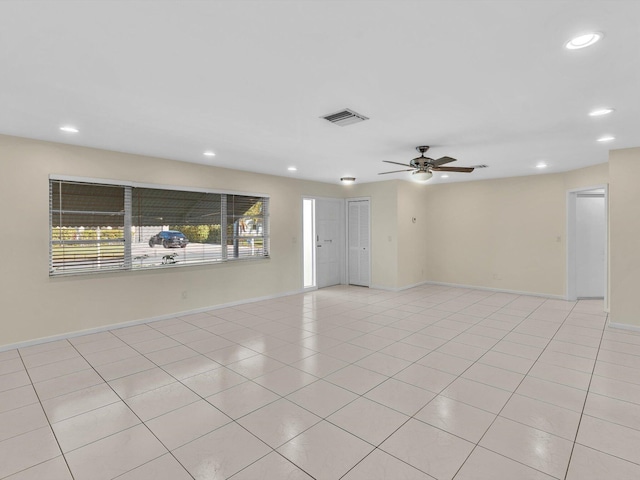 2710 SW 6th St SW, Boynton Beach, FL 33435 - unfurnished room with a ceiling fan, recessed lighting, baseboards, and light tile patterned flooring