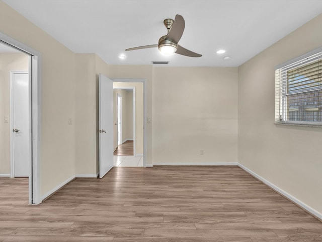 2710 SW 6th St SW, Boynton Beach, FL 33435 - empty room with light wood-style flooring, ceiling fan, baseboards, and recessed lighting