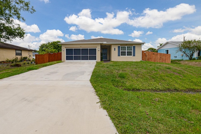 1222 SW Granadeer St, Port Saint Lucie, FL 34983 - view of front of home with concrete driveway, a garage, and stucco siding