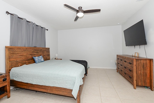 1222 SW Granadeer St, Port Saint Lucie, FL 34983 - bedroom featuring light tile patterned flooring, a ceiling fan, and baseboards